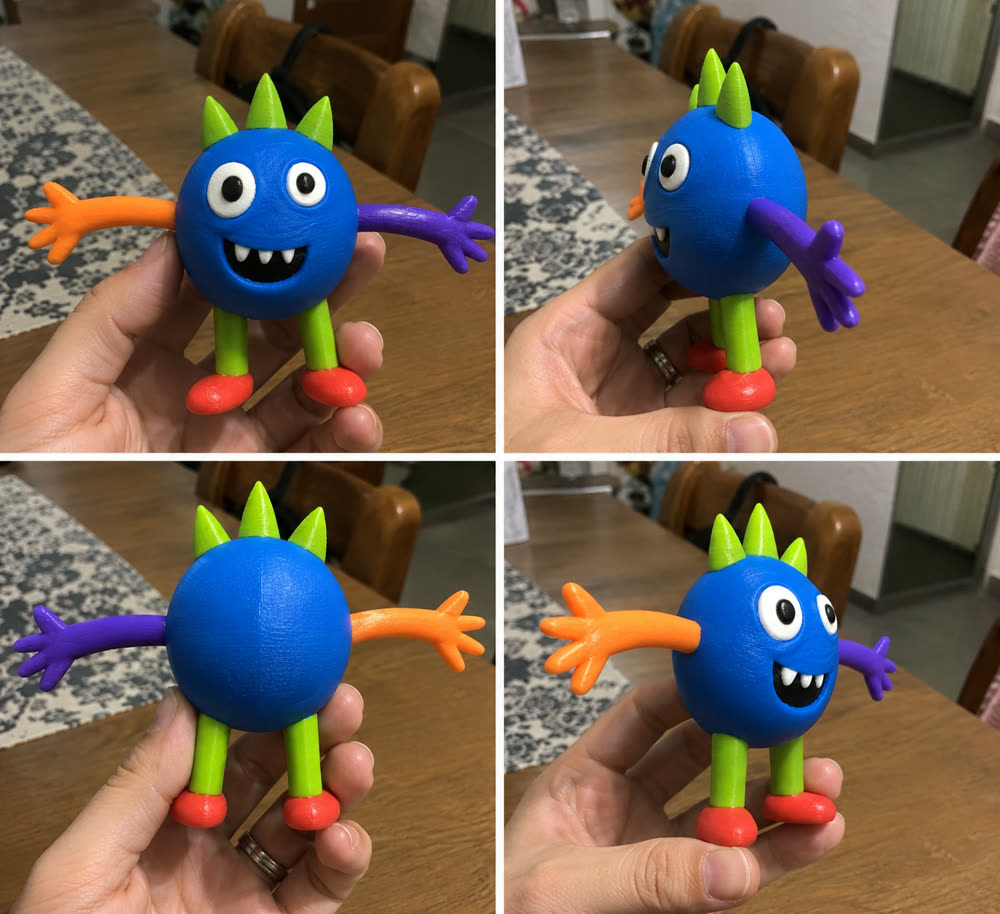 Cuatro vistas de la figura impresa en 3D del monstruo azul: frente, tres cuartos, espalda y perfil